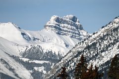 22C Pilot Mountain Glow At Mid-Day From Bow River Bridge In Banff In Winter.jpg